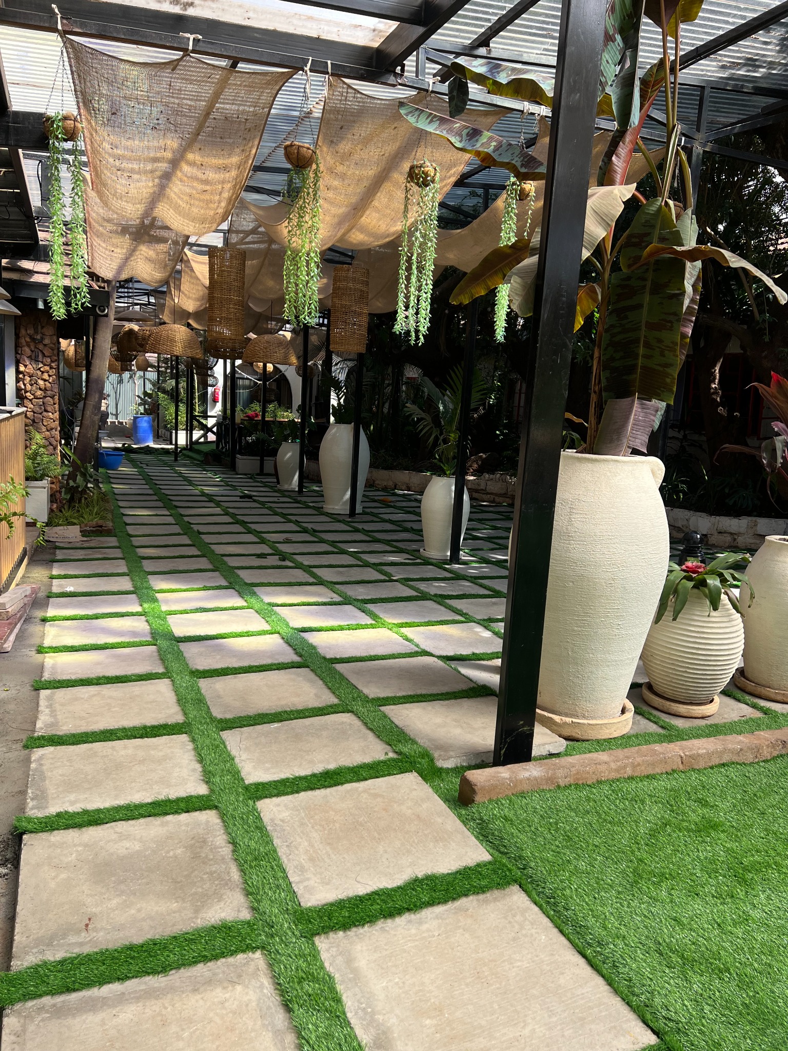 Restaurant entrance after artificial grass installation