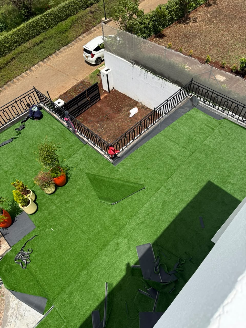 Outdoor area after TurfgrassKE artificial grass installation